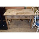 Small weathered oak two drawer writing table
