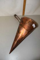 A large copper ale warmer