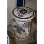 A modern porcelain stool with elephant head decoration