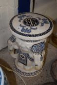 A modern porcelain stool with elephant head decoration