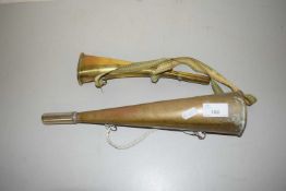 Two small brass horns