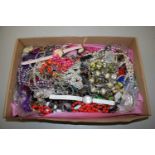 A large box of various assorted costume jewellery