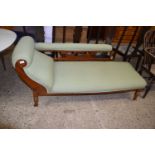 A late Victorian pale green upholstered chaise longue