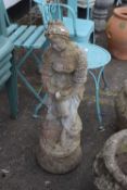 Concrete statue of a lady holding a bird, 85cm high