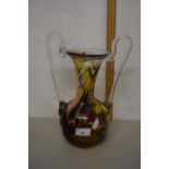 A double handled Art Glass vase