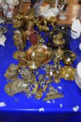 Mixed Lot: Various assorted brass ornaments, candlesticks, horse brasses, table bell etc