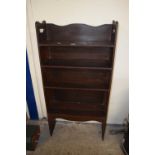 An early 20th Century open front bookcase cabinet