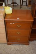 A Stag three drawer bedside chest