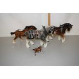 Mixed Lot: Horse models comprising a Beswick brown shirehorse together with two further examples and