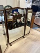 A three fold dressing table mirror