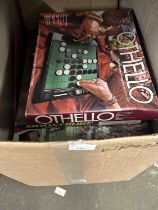 Box of assorted board games