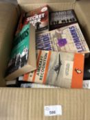 Box of assorted paperbacks to include military interest and others
