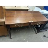 A stained pine two drawer side table