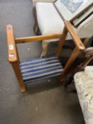 An upholstered kneeler with hand rails