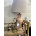 A brass based table lamp and a further ceramic based table lamp (2)