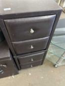 A pair of brown faux leather bedside cupboards