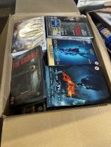 Box of assorted DVD's