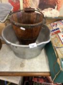 A small wooden bucket and a jam pan
