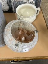 Glass ceiling shade and a chamber pot