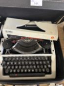 An Olympia typewriter, cased