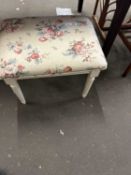 A cream painted floral upholstered dressing table stool