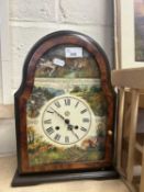 A modern mantel clock decorated with country scenes