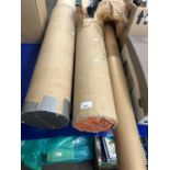 Rolls of masking tape and rolls of paper