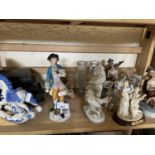 Quantity of assorted figurines, glass and a book end