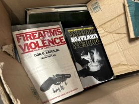 Non fiction books on guns and gun control, mixture of paperback and hardback