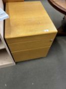 Three drawer wooden office desk of drawers