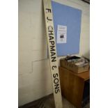 A painted wooden sign for F J Chapman & Son