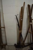 Bundle of implements to include hoe's, lifting fork, hooks etc