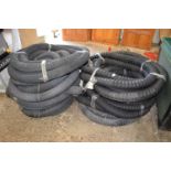 Two lengths of rubber piping