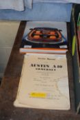 A Rolls Royce Enthusiast Club instruction manual together with an Austin A40 service manual