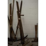 Bundle of various tools to include a scythe, various hoe's etc
