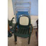 Two uPVC garden chairs together with a sun lounger