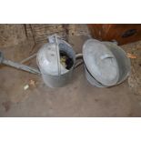 Galvanised watering can together with a galvanised bucket