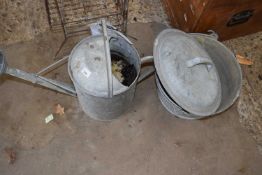 Galvanised watering can together with a galvanised bucket