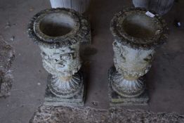 Two composite garden urns/planters