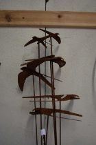 Iron garden sculpture, swallows on sticks