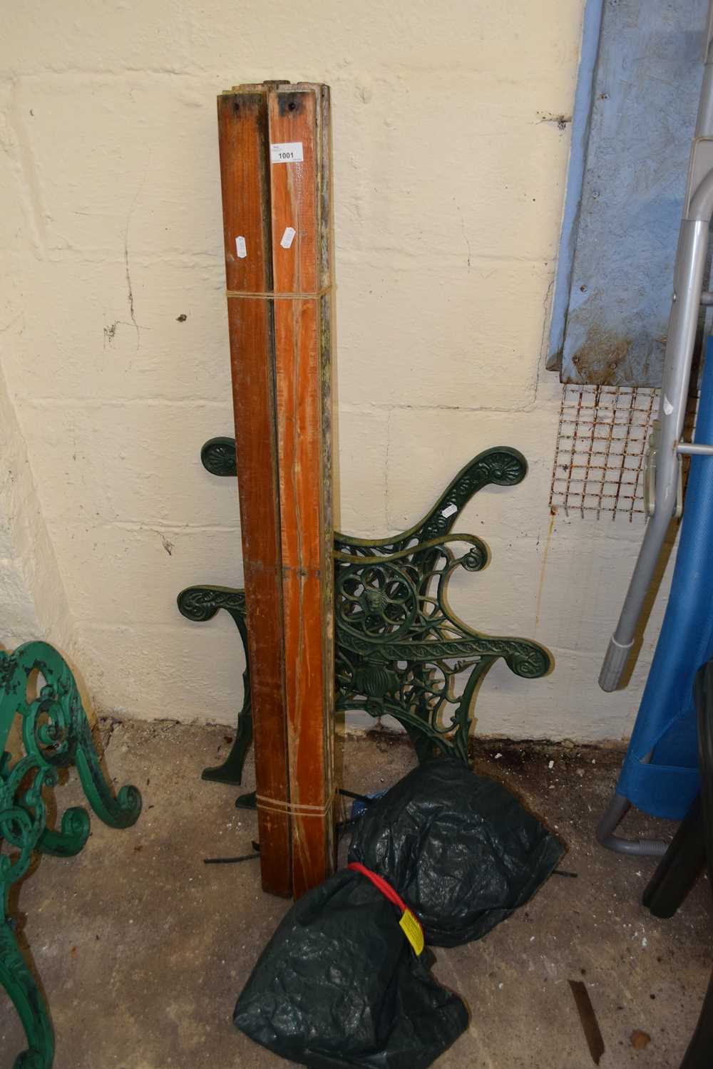 Cast iron bench with wooden slats in flat pack form