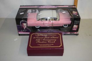 An Elvis Presley pink cadillac model together with a Variety Club anniversary Sunshine Coach model