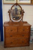 Victorian mahogany four drawer dressing chest with oval mirrored back
