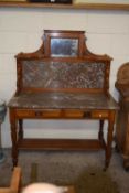 A Victorian marble topped wash stand with mirrored panel to the back