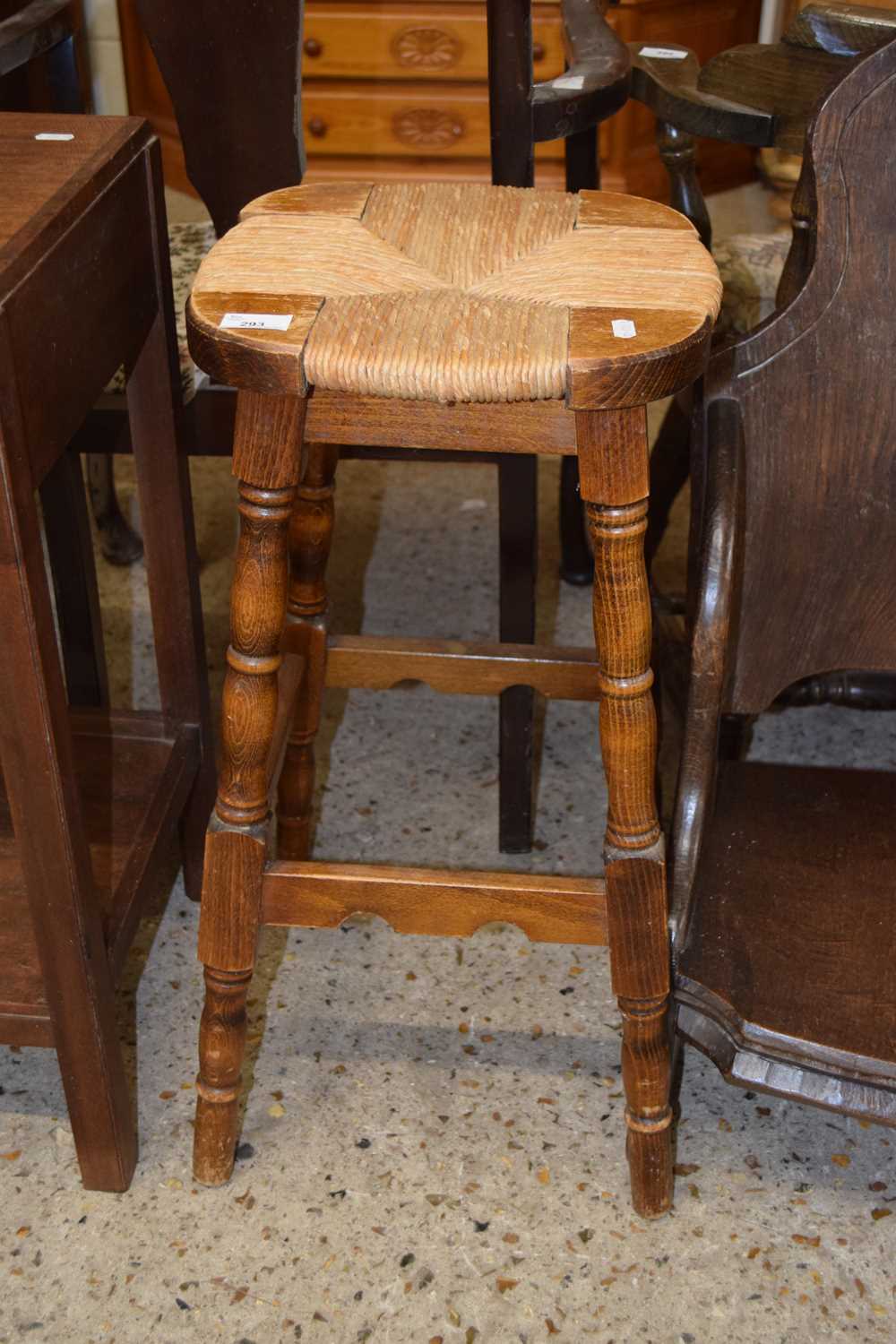 A rush seated bar stool