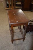 20th Century oak dining table on barley twist legs
