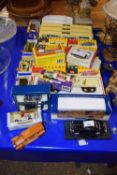 A collection of boxed vehicles mainly Vanguard and various model commercial vehicles