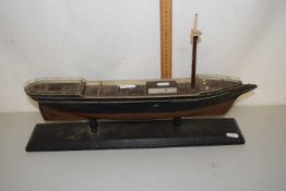 A wooden model of a boat