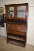 An early 20th Century style Arts & Crafts style oak bureau bookcase for restoration