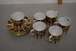 A Royal Crown Derby pattern 1128 group of six coffee cups and saucers